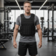 The men at gym with Weight Vests
